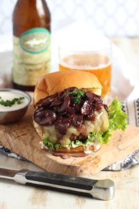 Beef bourguignon burger on cutting board