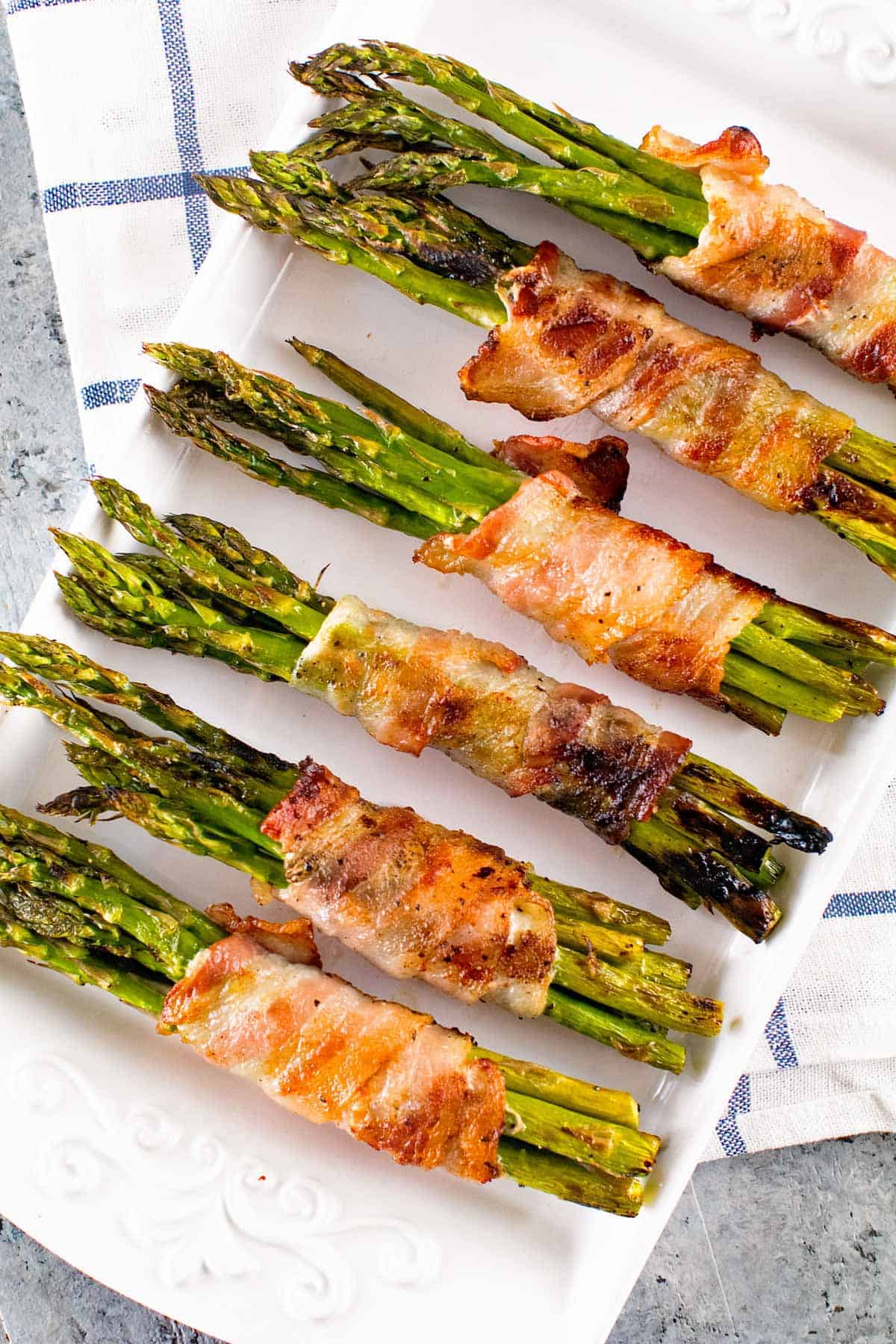 Grilled Bacon Wrapped Asparagus ~ Easy, Grilled Side Dish! Crispy Bacon Wrapped Around Tender Asparagus Spears!