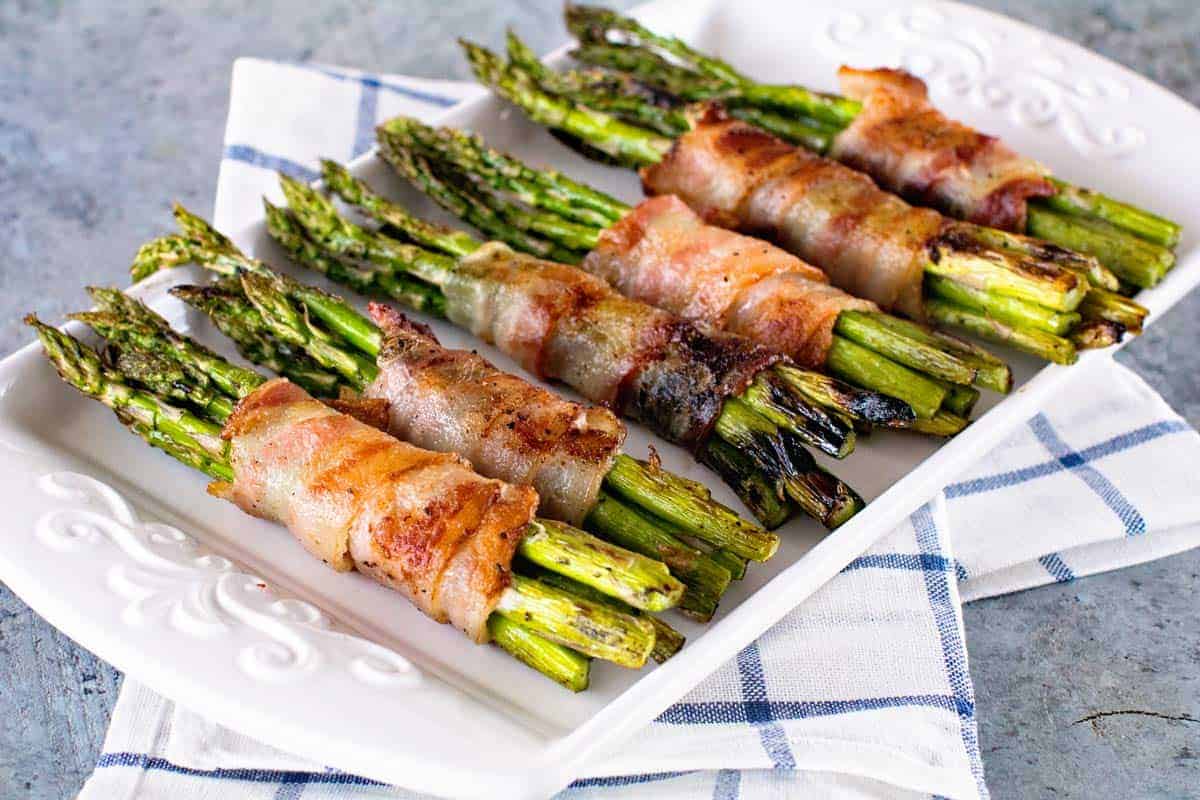 Grilled Bacon Wrapped Asparagus ~ Easy, Grilled Side Dish! Crispy Bacon Wrapped Around Tender Asparagus Spears!