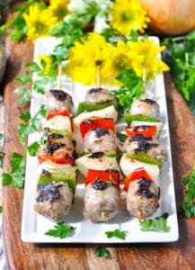 Grilled Italian Sausage kabobs on plate