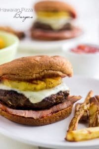 Hawaiian Pizza Burger and fries on white plate