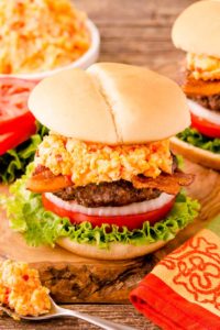 Pimento cheese burger with bacon, onion, tomato, and lettuce