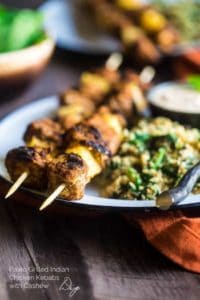 Indian paleo chicken kebabs and rice on plate