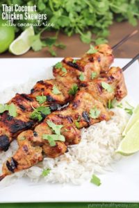 Thai coconut chicken skewers and rice on plate