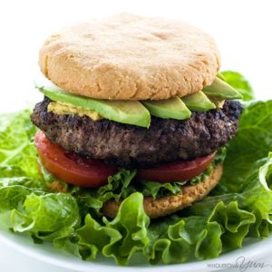 Hamburger with avocado, tomato, and lettuce