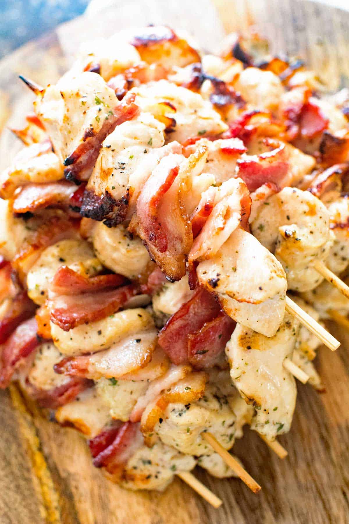 Chicken Bacon Kabobs on cutting board