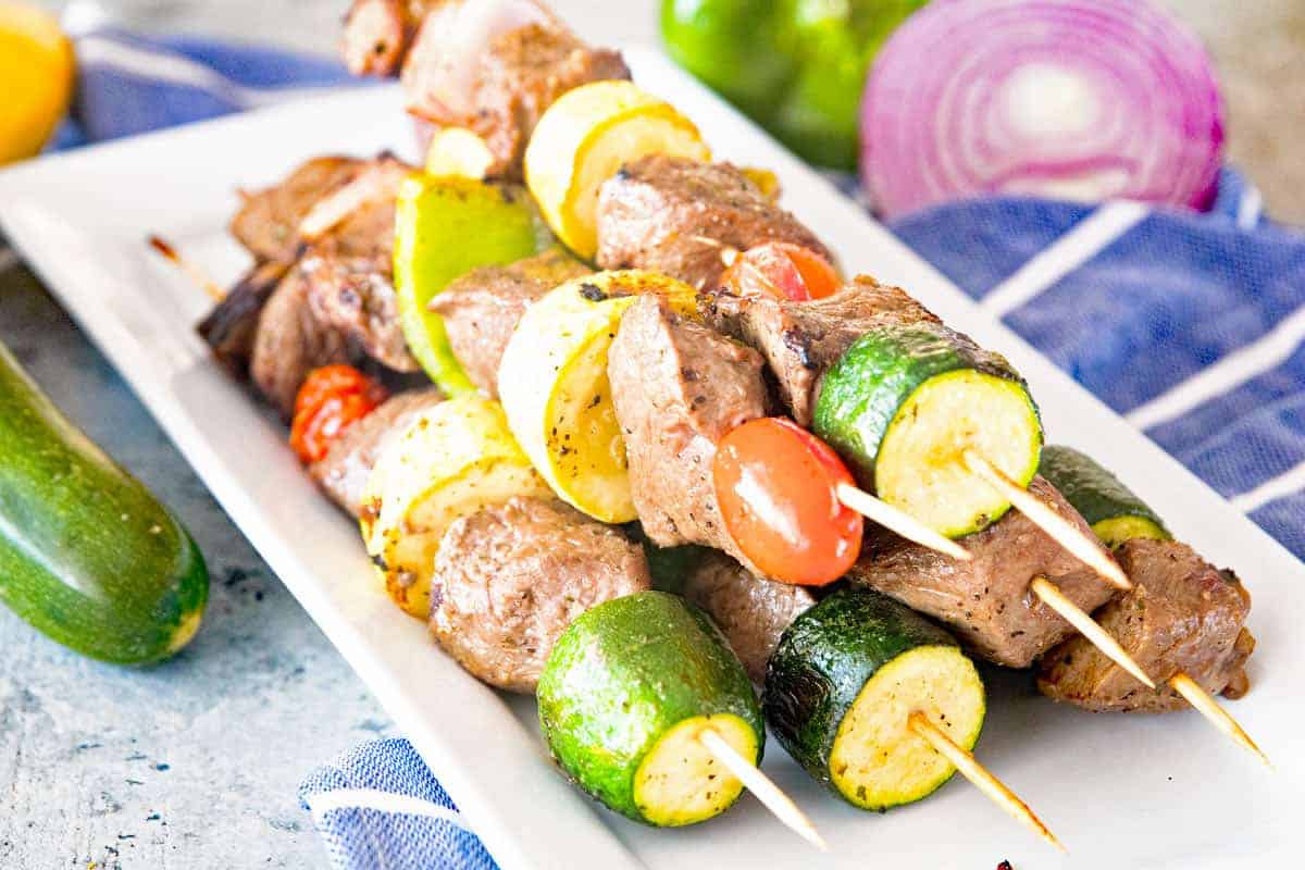 Marinated Grilled Vegetable and Steak Kabobs on plate