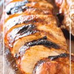 Grilled Asian Pork Loin slices on cutting board