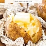 Grilled baked potato with butter in foil