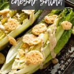 Grilled caeser salad on metal pan