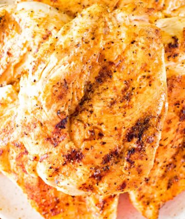 Juicy Grilled Chicken Breast on white plate