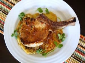 Sweet and spicy pineapple grilled pork chop on plate