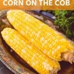 Grilled corn on the cob on serving tray