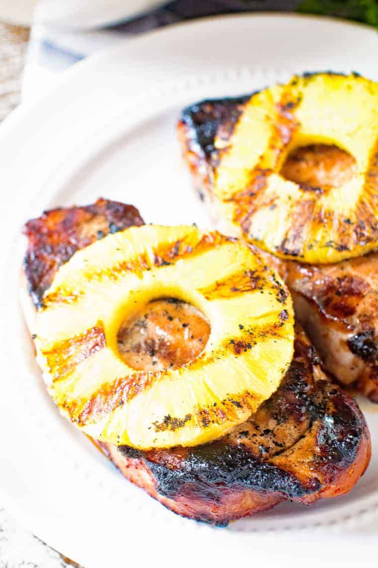 Grilled pineapple pork chop on a plate