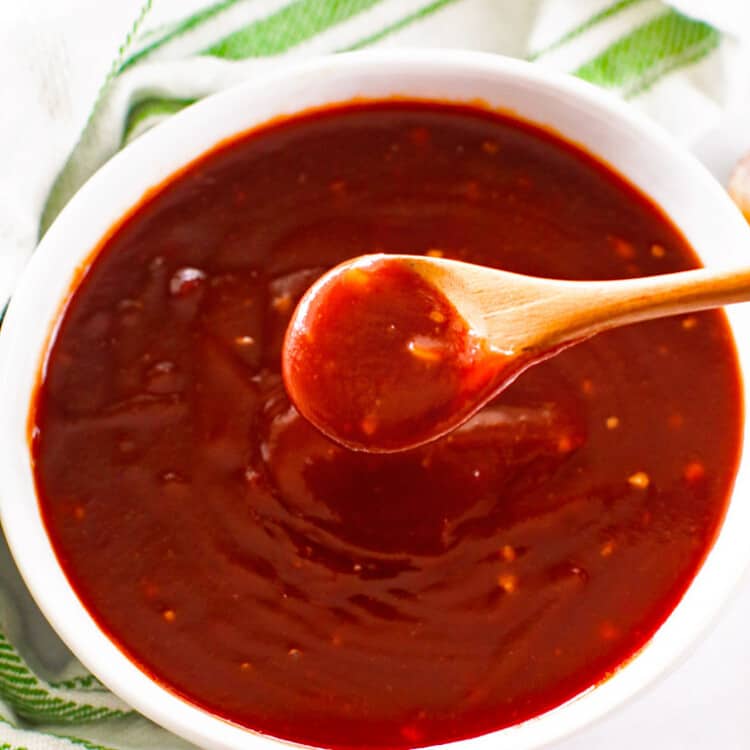 Sweet and Sassy BBQ Sauce on wood spoon