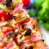Hand holding Asian Chicken Skewers