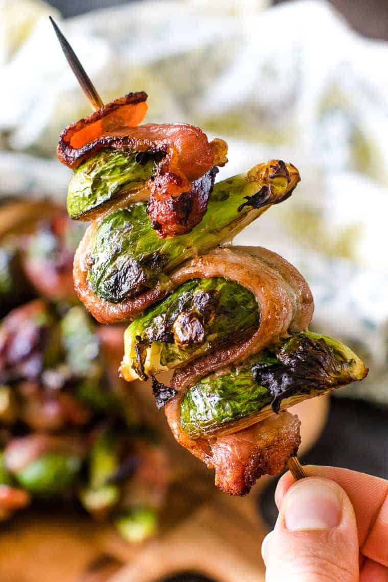 Skewer of bacon wrapped grilled Brussels sprouts