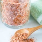 Easy rib rub in glass jar and wooden spoon