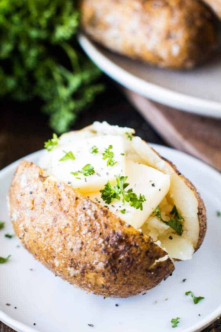 Smoked Baked Potato with butter on plate