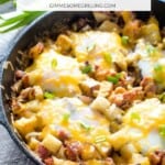 Breakfast skillet full of eggs, potatoes, and cheese