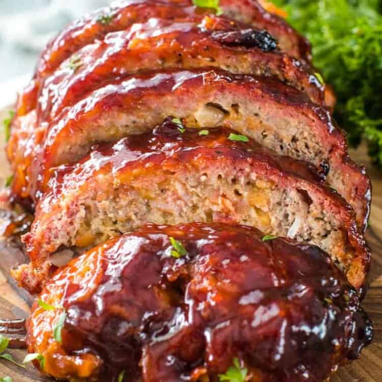 Cheesy Traeger Meatloaf cut into pieces