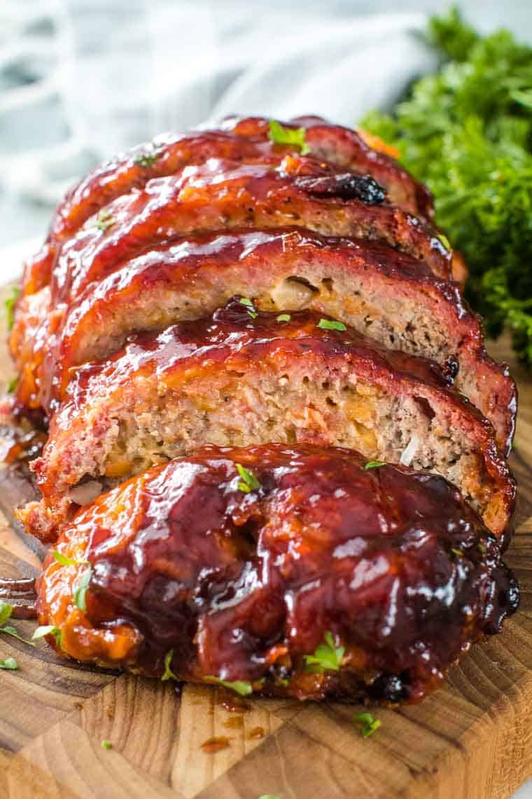 Cheesy Traeger Meatloaf cut into pieces