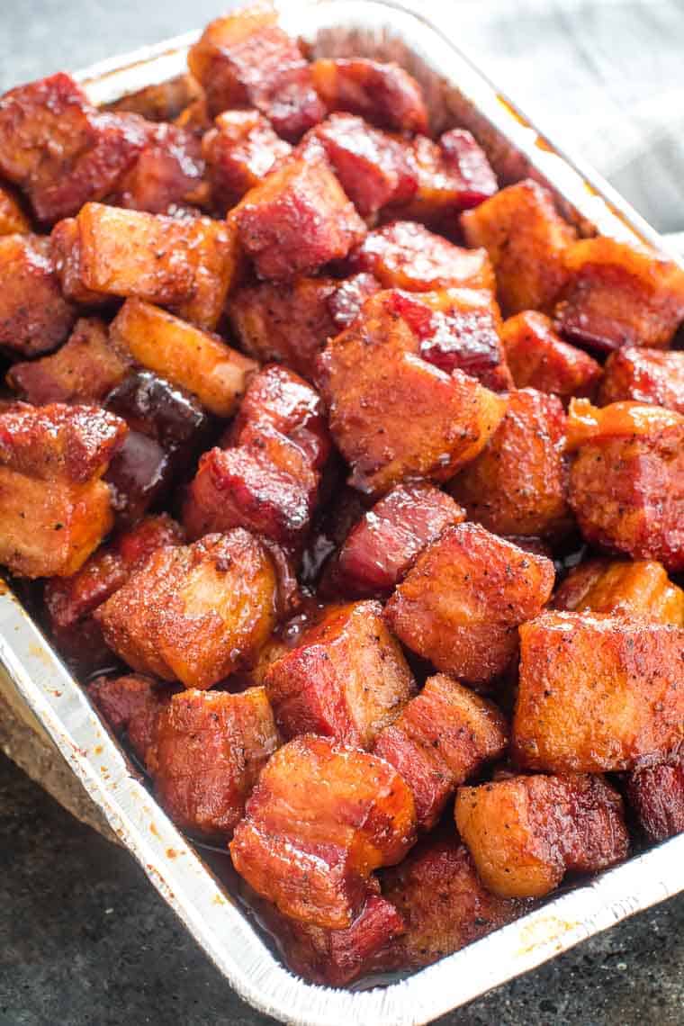 smoked pork belly burnt ends in foil pan