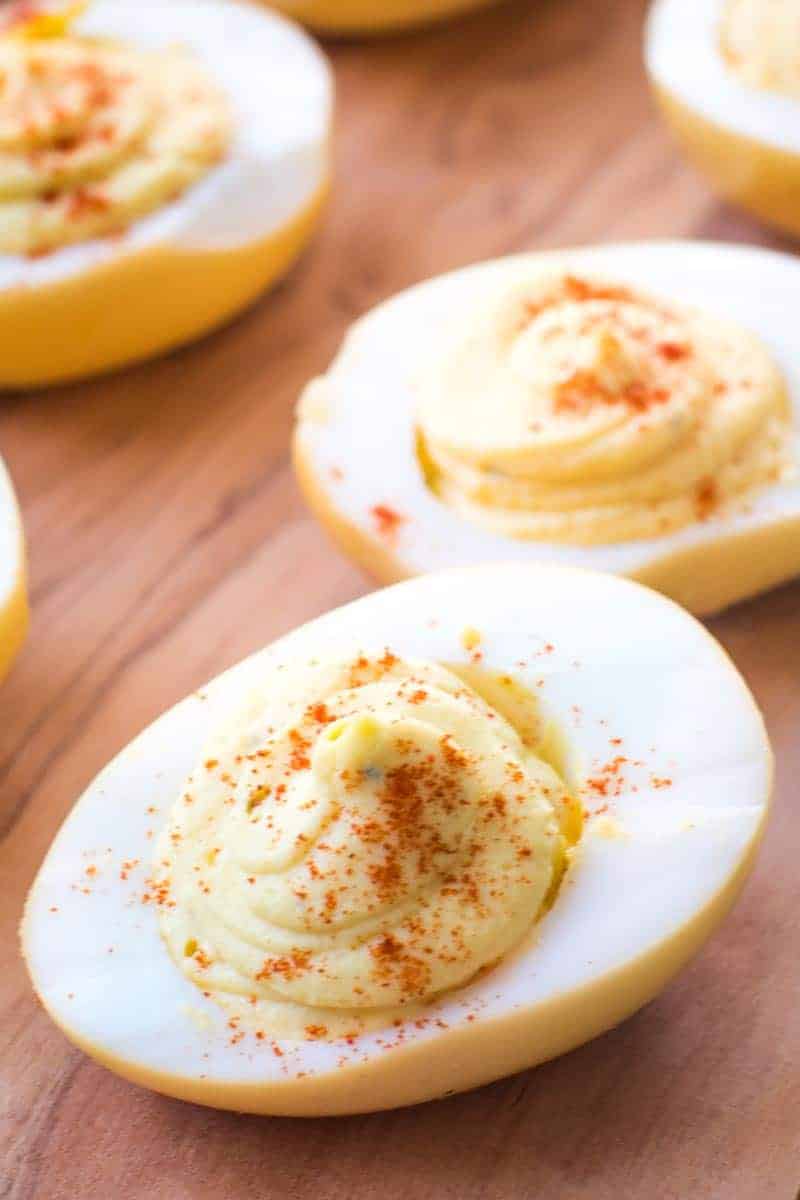 Prepared Smoked Deviled Eggs on wood cutting board