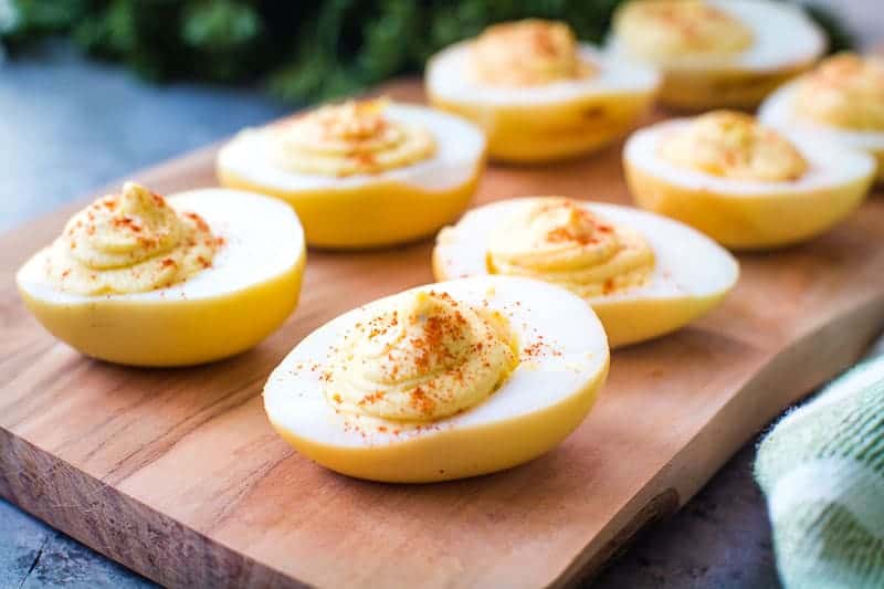 Wood plank with prepared smoked deviled eggs