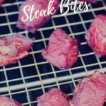Teriyaki steak bites on metal grate