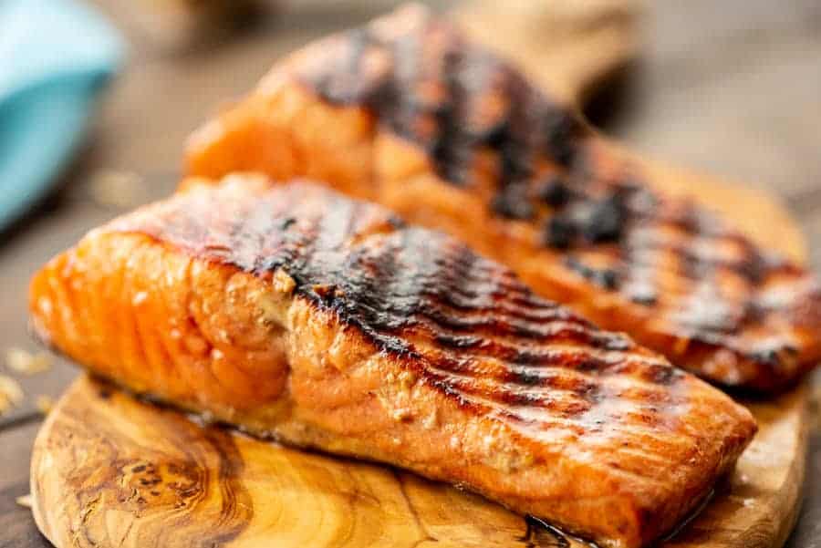 Easy Salmon on the Grill on a wood board