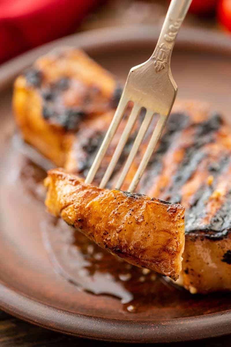 Piece of Grill-Pork-Chops on fork