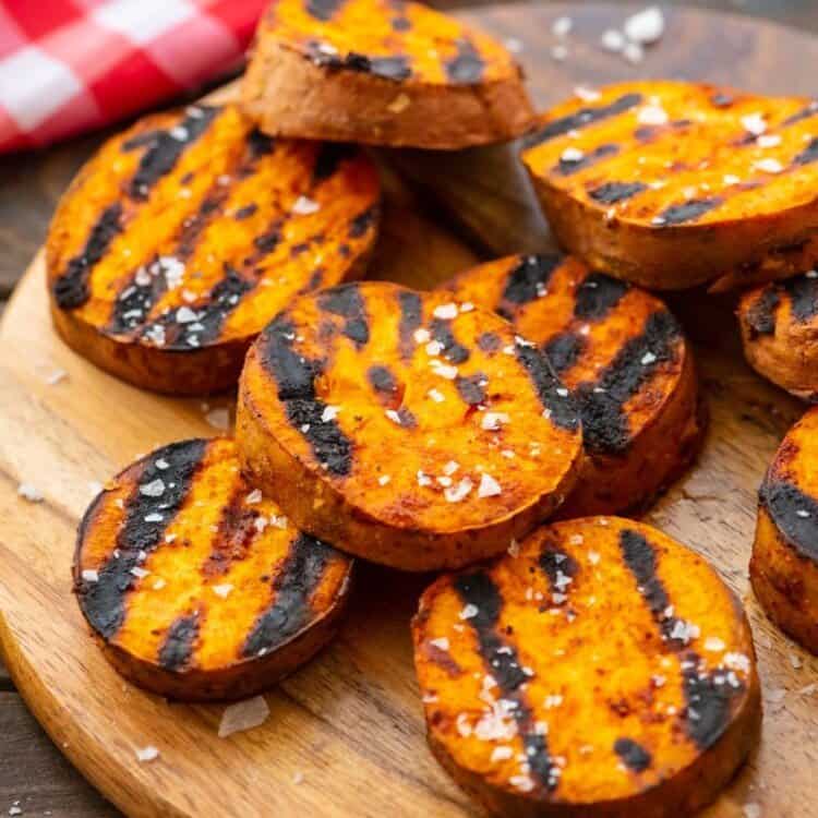 wood cutting board with Grilled-Sweet-Potatoes-Recipe
