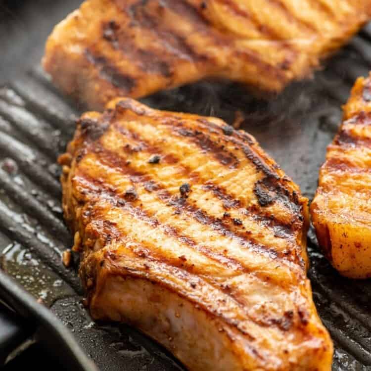 Marinated pork chops on grill pan