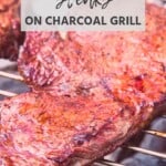 Steak on charcoal grill