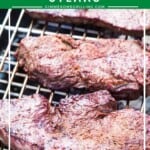 Charcoal grilled steak on rack