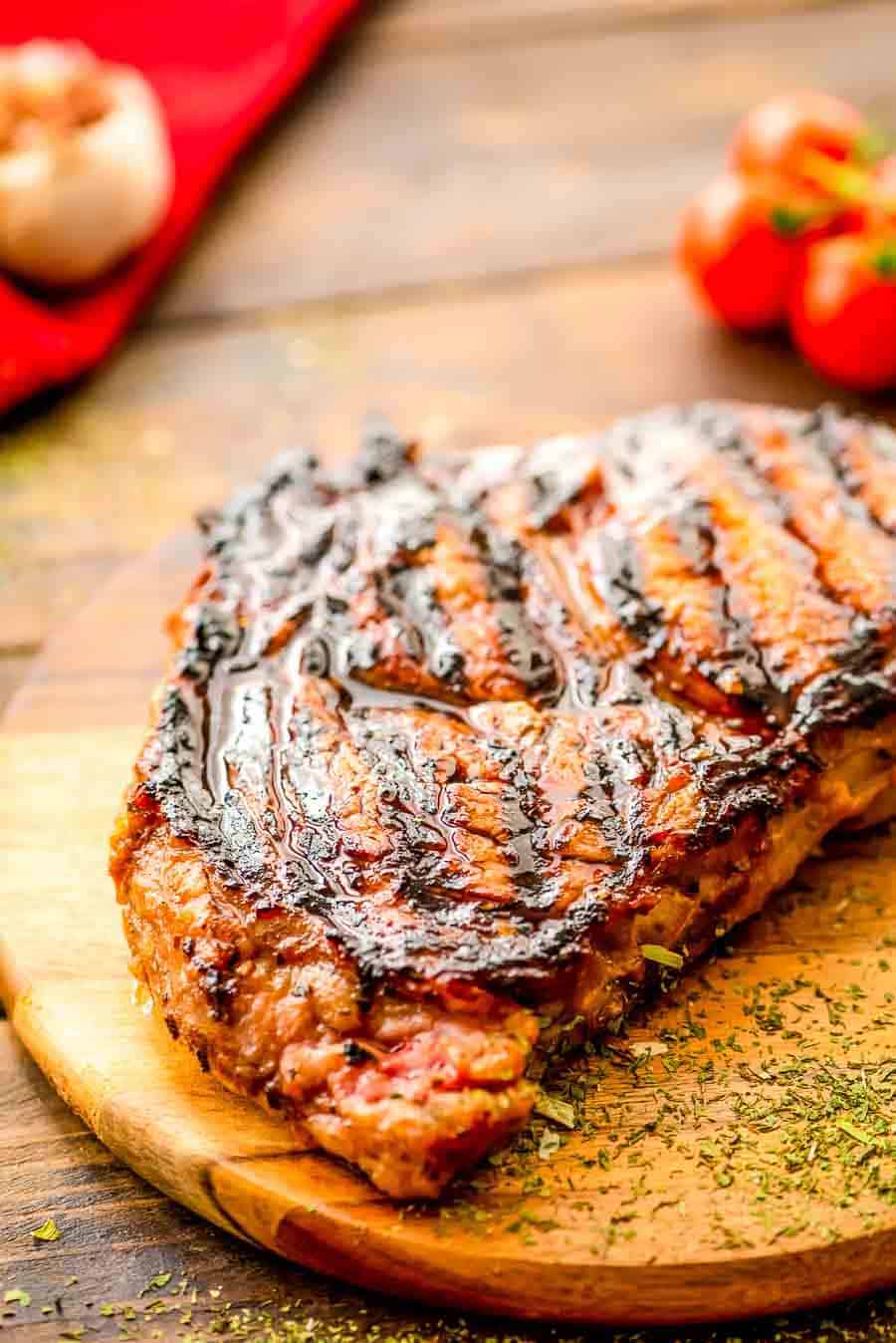 Grilled italian dressing steak on cutting board