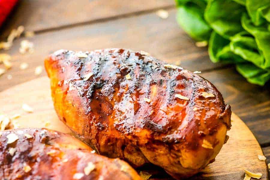 Grilled Teriyaki Chicken breasts on cutting board