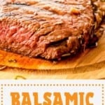 Balsamic steak marinade pinterest image with a medium steak cut on a wooden cutting board.