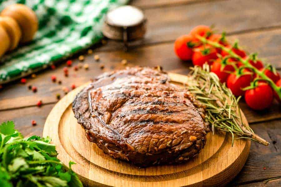 Balsamic Steak prepared in Marinade on cutting board