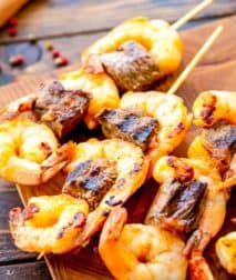 Grilled Steak and Shrimp Kabobs on cutting board
