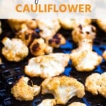 grilled cauliflower on a black plate