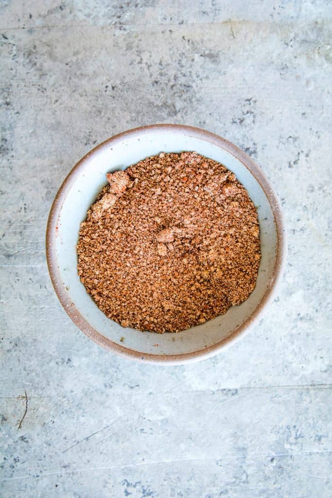Overhead image of a gray bowl of seasonings after mixing