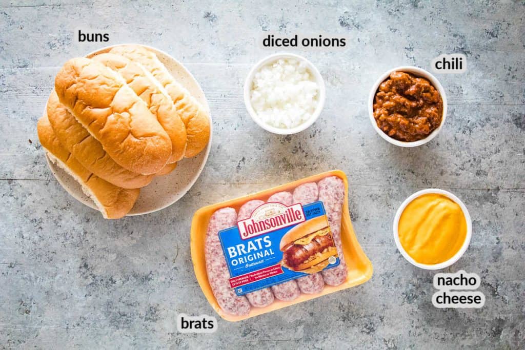Overhead image of ingredients for chili cheese brats.