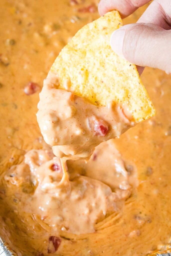 Dip scooping Smoked Queso Dip