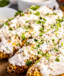 Mexican Street Corn on a wooden cutting board