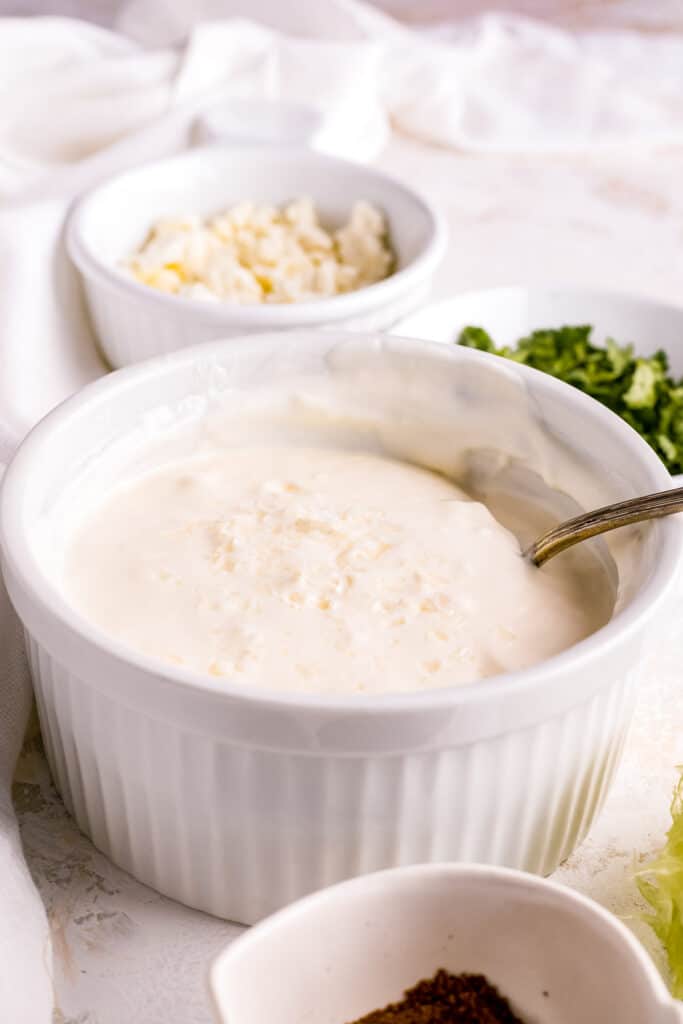 Creamy sauce to put on top of Elote