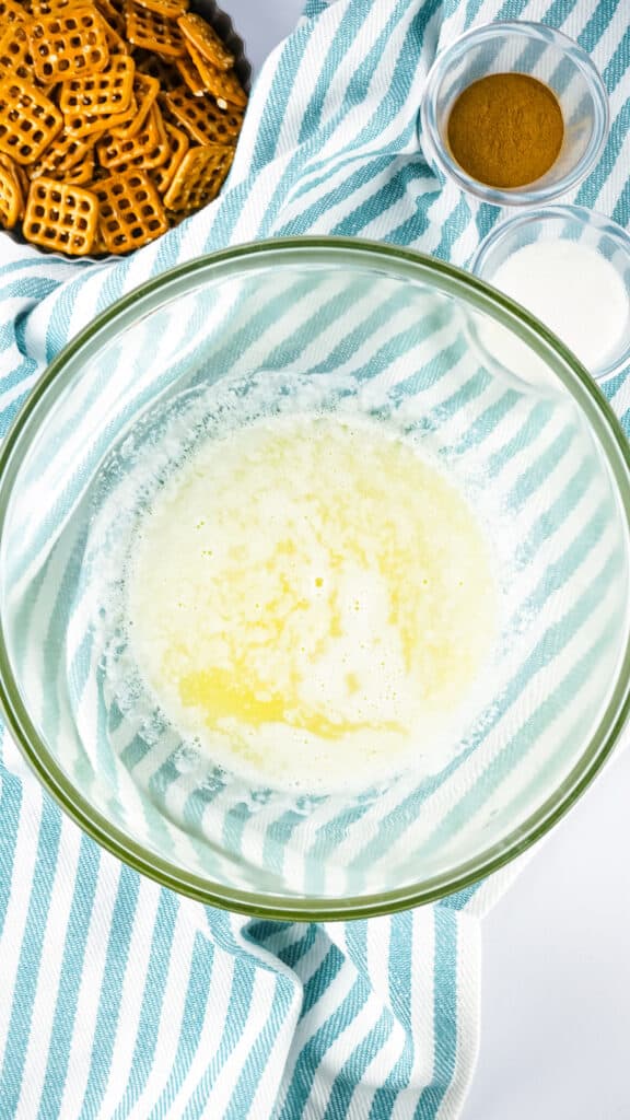 Overhead image of melted butter in glass bowl