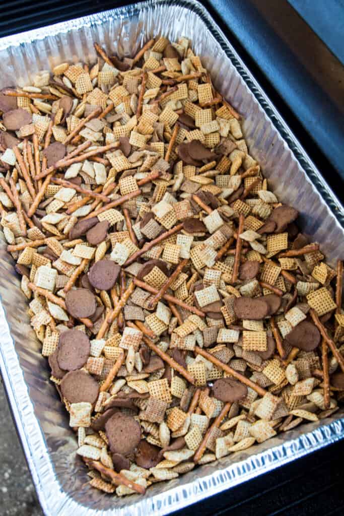 Aluminum foil pan in smoked with chex mix