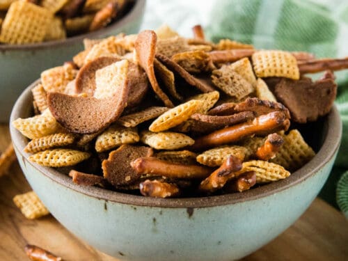 Smoky BBQ flavored Chex mix in a rustic bowl